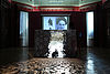 Slavs and Tatars, 79.89.09 lecture, (mirror-mosaic Resist Resisting God, books, projector), 2009. Courtesy by Secession.